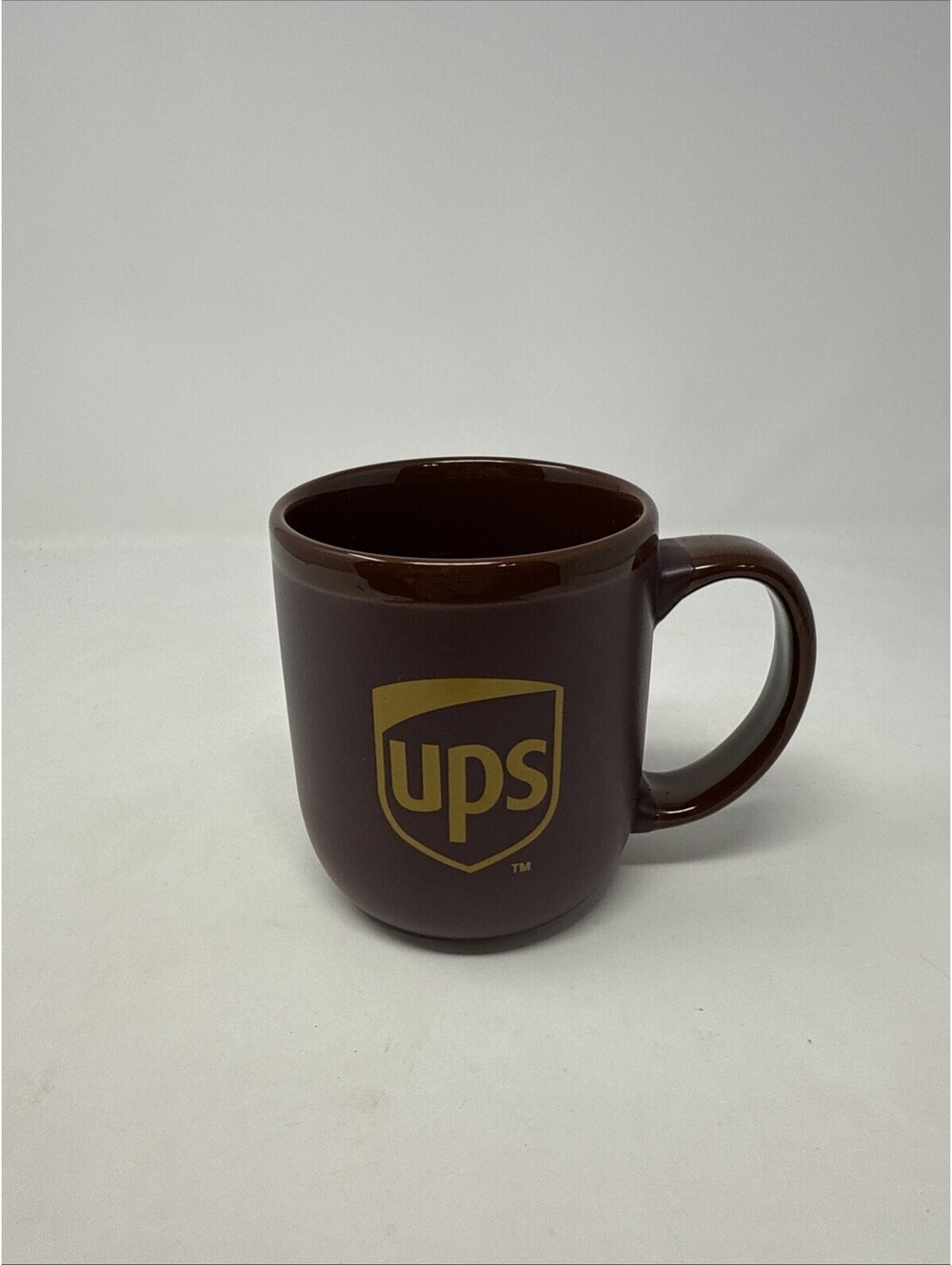 UPS Heavy 17oz mug. Brown Matte Outer Finish. Glossy Rim And Handle Finish.